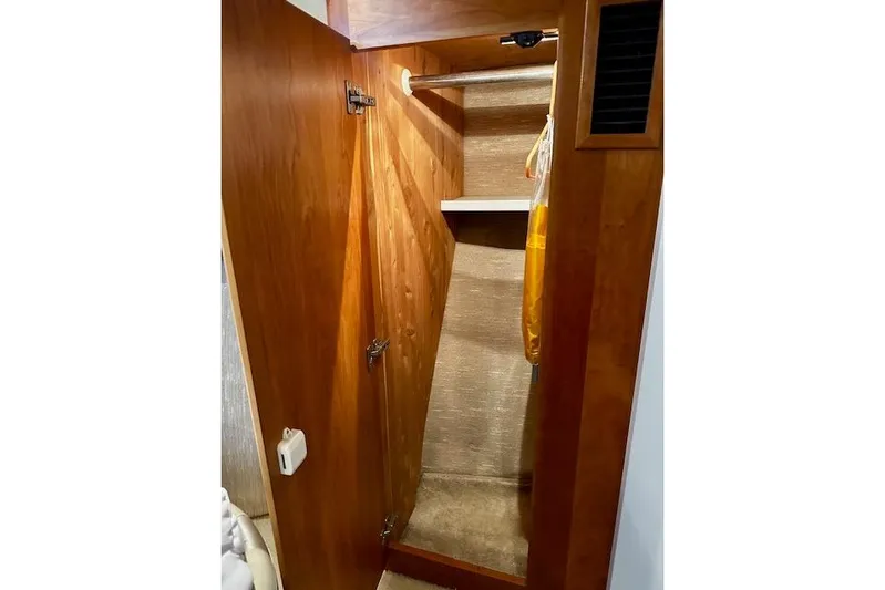  Yacht Photos Pics Wooden closet interior on a 2001 Silverton 42 Convertible yacht.