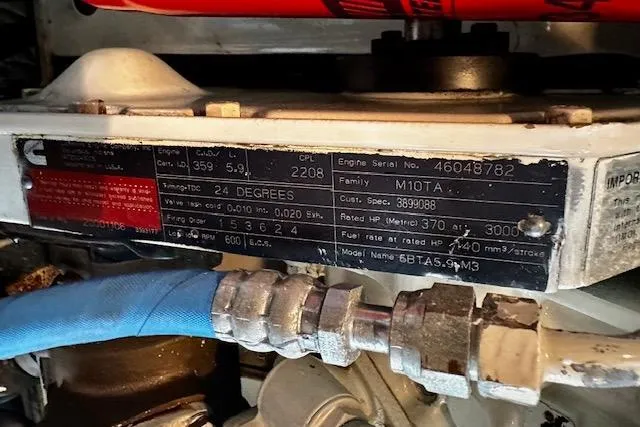  Yacht Photos Pics Engine label on a 2001 Silverton 42 Convertible, featuring Cummins specifications and serial details.