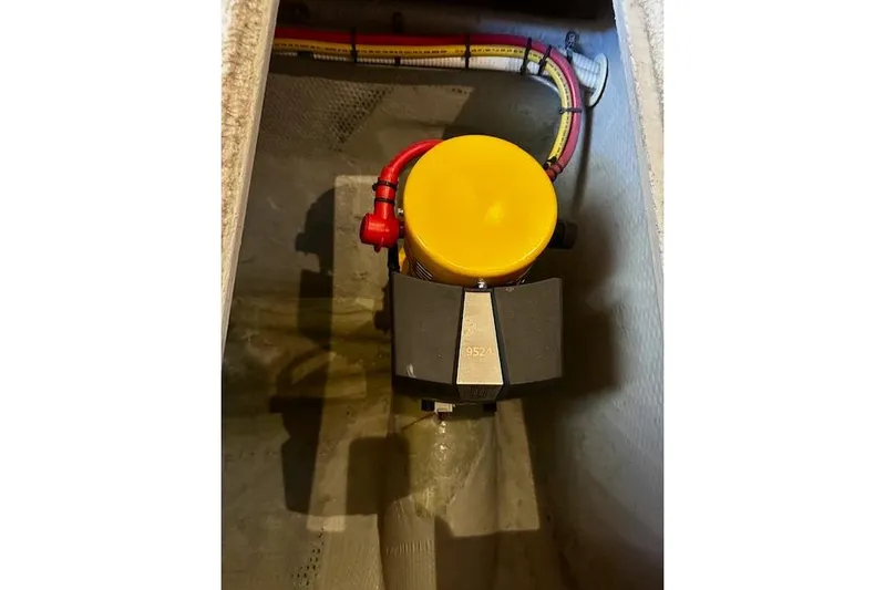  Yacht Photos Pics 2001 Silverton 42 Convertible engine compartment with yellow-capped component and wiring.