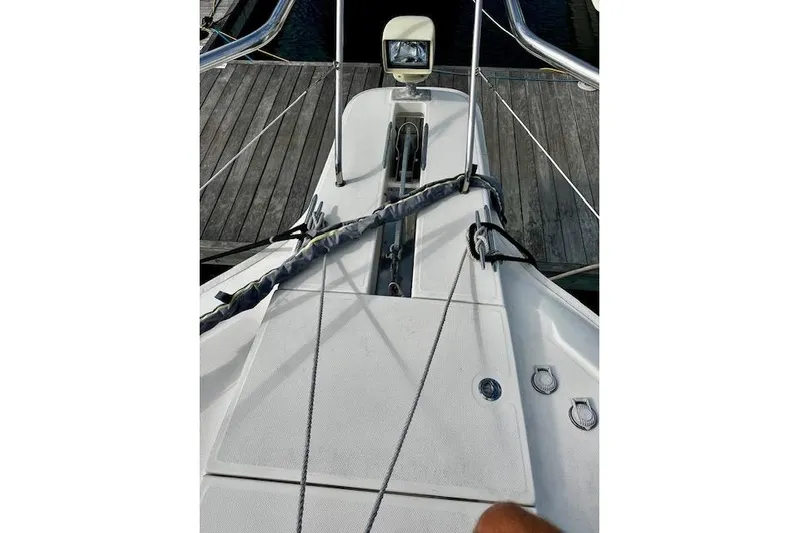  Yacht Photos Pics 2001 Silverton 42 Convertible yacht deck with ropes and dock view.