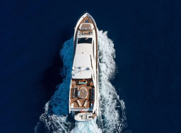 Grace Yacht Photos Pics Aerial view of 2009 Astondoa 96 GLX yacht cruising on open water.