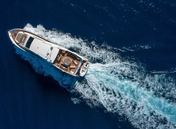 Grace Yacht Photos Pics Astondoa 96 GLX yacht cruising on open sea, aerial view, 2009 model.