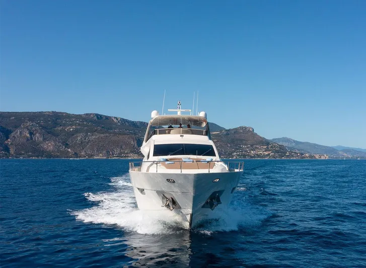 Grace Yacht Photos Pics Astondoa 96 GLX yacht cruising on blue ocean with scenic mountain backdrop, 2009 model.