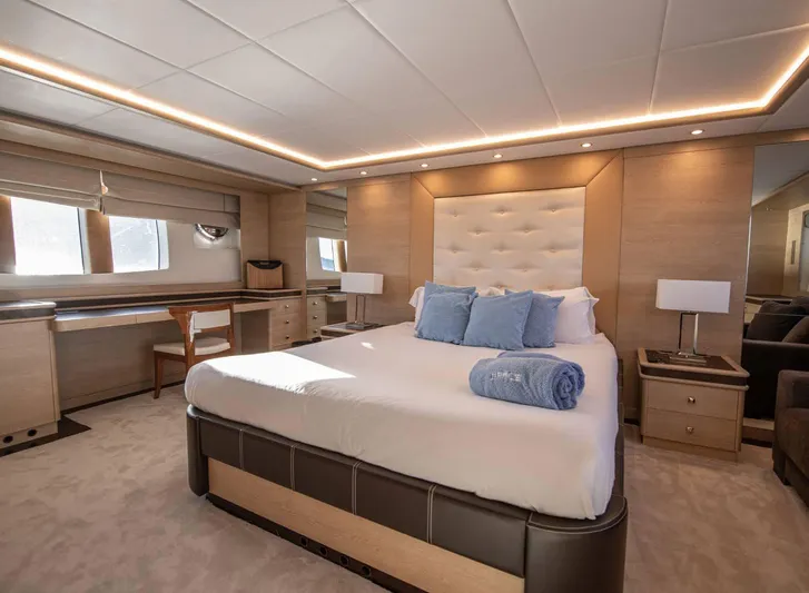 Grace Yacht Photos Pics Luxurious bedroom interior on 2009 Astondoa 96 GLX yacht with elegant furnishings.
