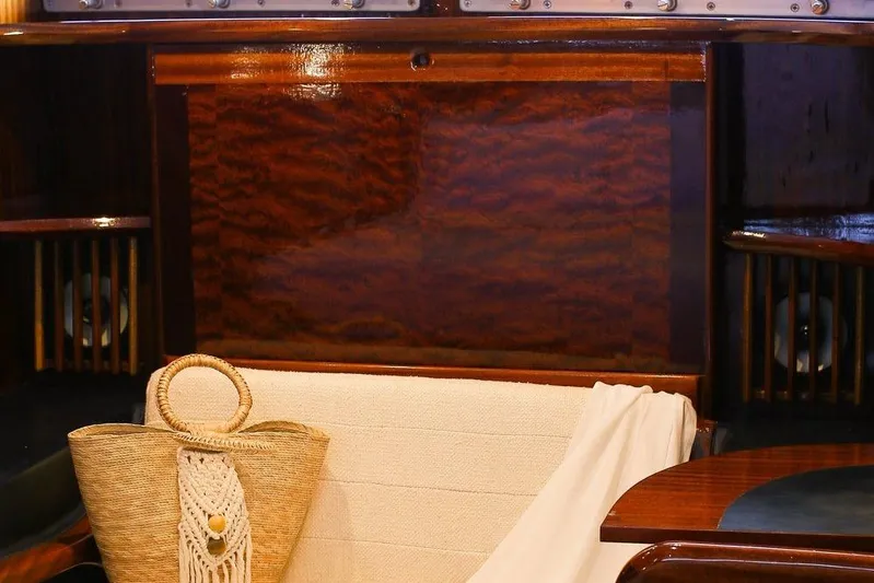 New School Yacht Photos Pics Interior of 1966 Chris-Craft Constellation with elegant wood paneling and woven basket.