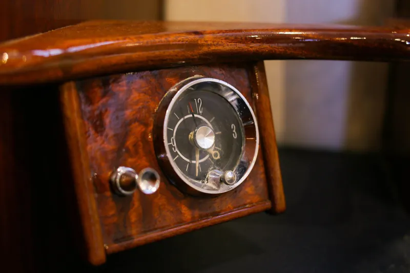 New School Yacht Photos Pics Vintage 1966 Chris-Craft Constellation wooden dashboard with classic clock design.