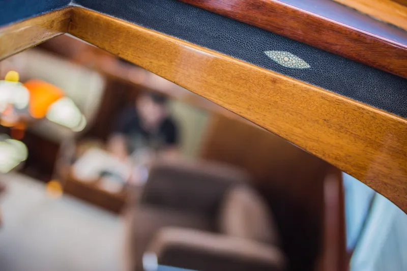 New School Yacht Photos Pics Interior view of a 1966 Chris-Craft Constellation yacht with wooden details.
