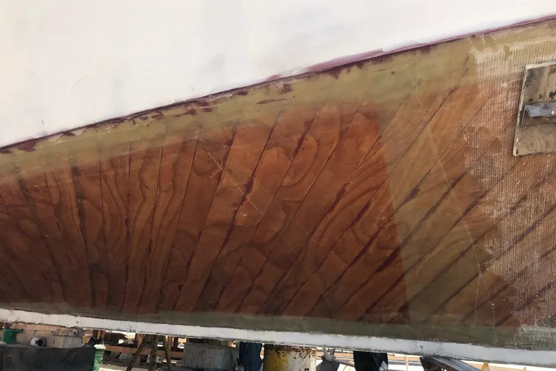 New School Yacht Photos Pics 1966 Chris-Craft Constellation boat hull with wood grain and fiberglass details.