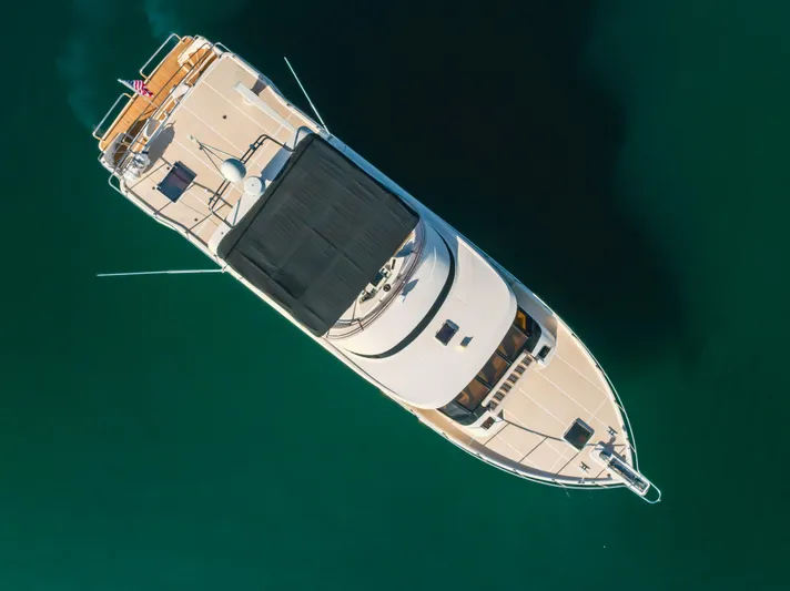 Artemis Yacht Photos Pics Aerial view of 1996 Offshore Yachts Pilothouse on calm water.