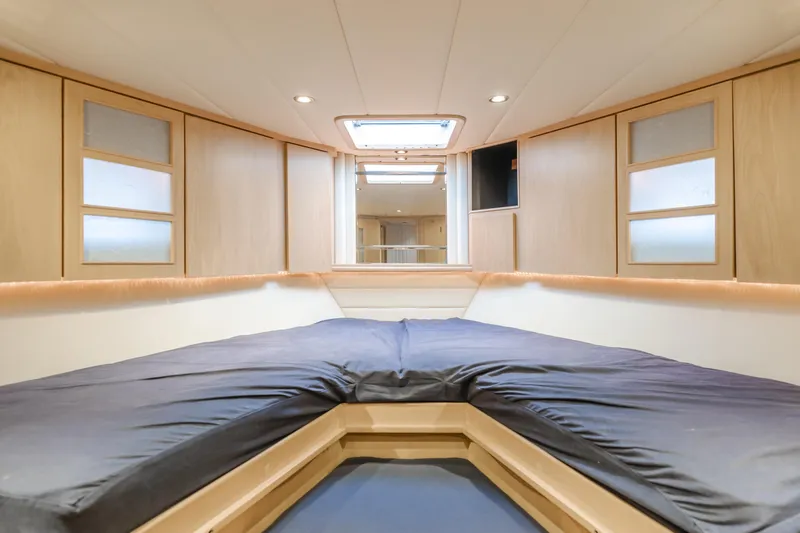 Artemis Yacht Photos Pics Interior of 1996 Offshore Yachts Pilothouse, featuring a spacious, modern cabin with natural wood finishes.