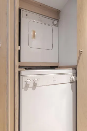 Artemis Yacht Photos Pics Stacked washer and dryer in 1996 Offshore Yachts Pilothouse.