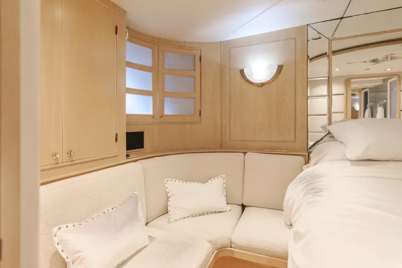 Artemis Yacht Photos Pics Luxurious 1996 Offshore Yachts Pilothouse interior with cozy seating and elegant wood finishes.