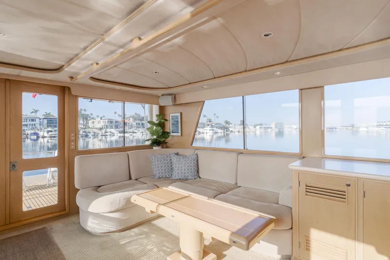 Artemis Yacht Photos Pics Luxurious 1996 Offshore Yachts Pilothouse interior with panoramic marina views.