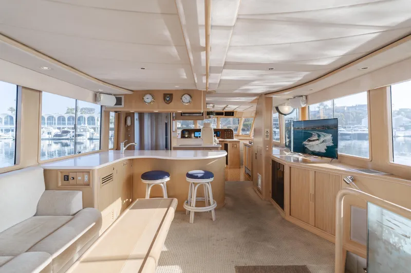 Artemis Yacht Photos Pics Luxurious interior of a 1996 Offshore Yachts Pilothouse, featuring modern amenities and panoramic windows.