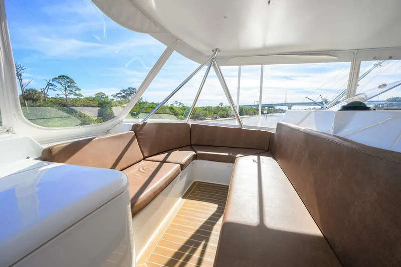 Hook'em Dan O Yacht Photos Pics Luxurious interior of 2006 Ocean Yachts 57 Super Sport with panoramic views.