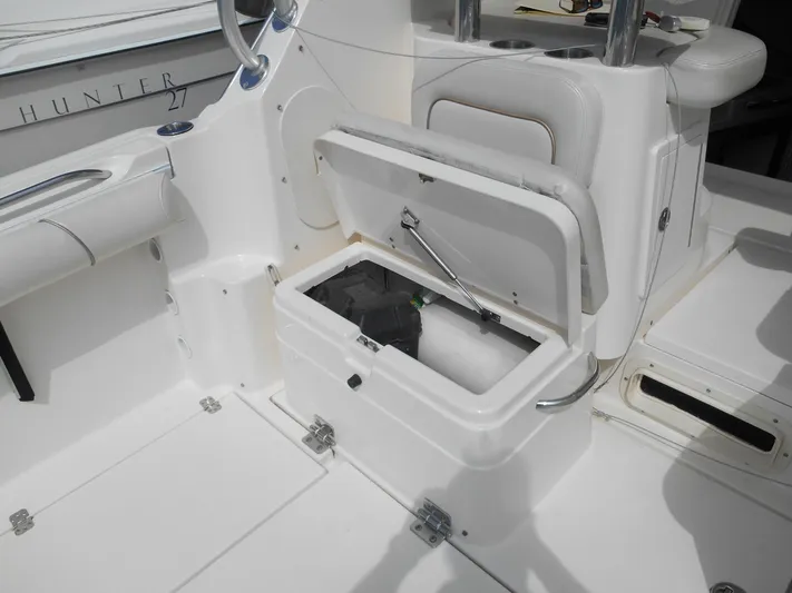 Delfini Yacht Photos Pics 2007 Wellcraft Coastal 270 boat interior with open storage compartment.