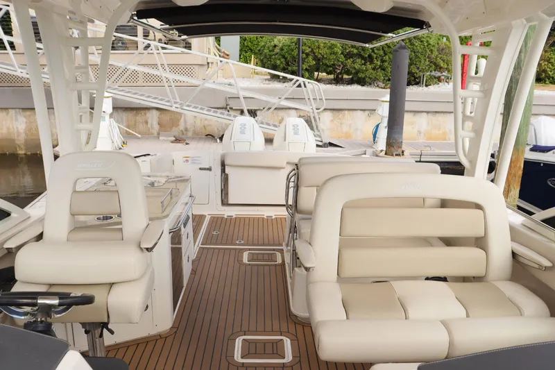  Yacht Photos Pics 2021 Boston Whaler 320 Vantage interior with luxurious seating and modern design.