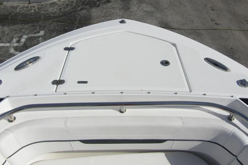  Yacht Photos Pics 2023 Blackfin 252 DC boat deck with white seating and stainless steel rail.