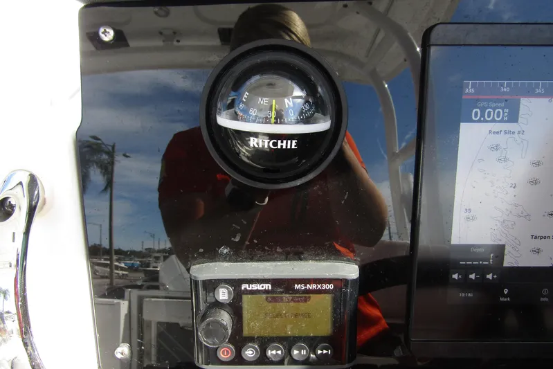  Yacht Photos Pics Dashboard of 2023 Blackfin 252 DC with compass and navigation display.
