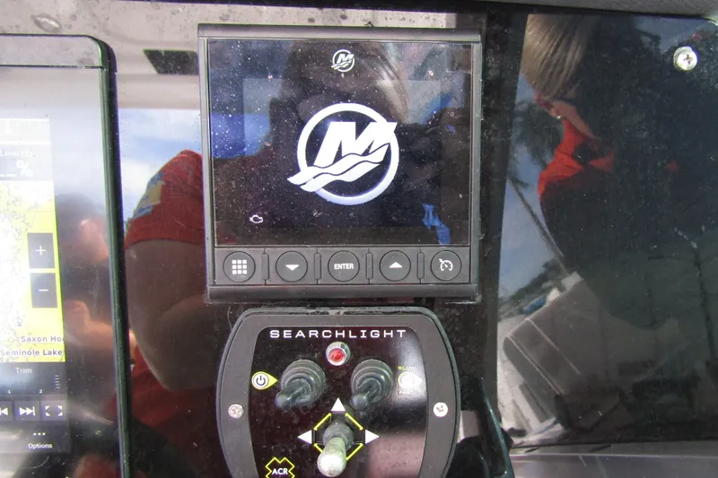  Yacht Photos Pics Control panel of 2023 Blackfin 252 DC boat with searchlight controls.