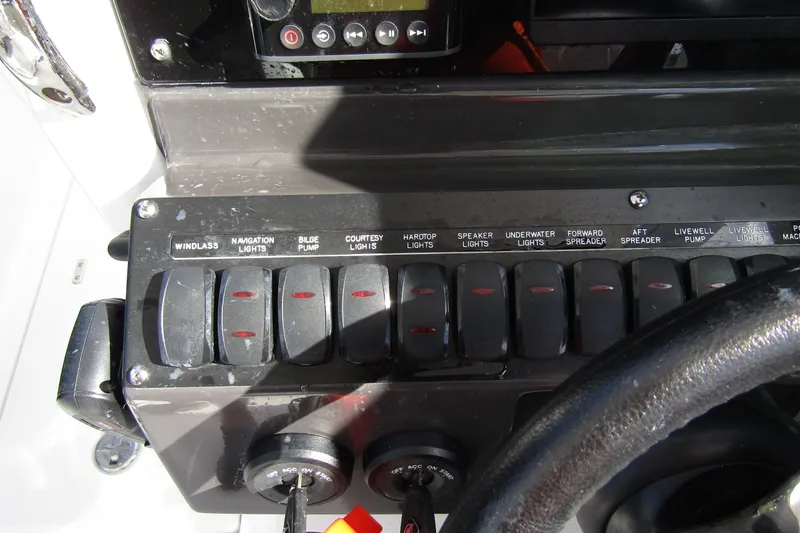  Yacht Photos Pics Control panel of a 2023 Blackfin 252 DC boat with labeled switches.
