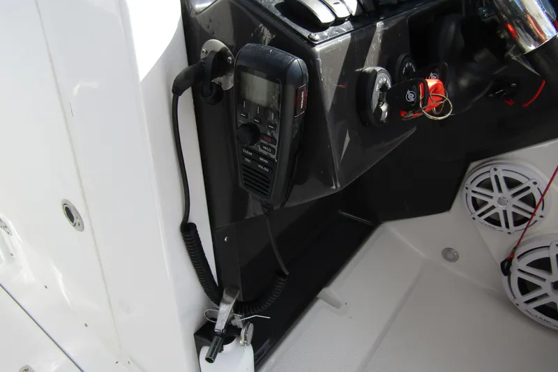  Yacht Photos Pics 2023 Blackfin 252 DC boat dashboard with radio and controls.