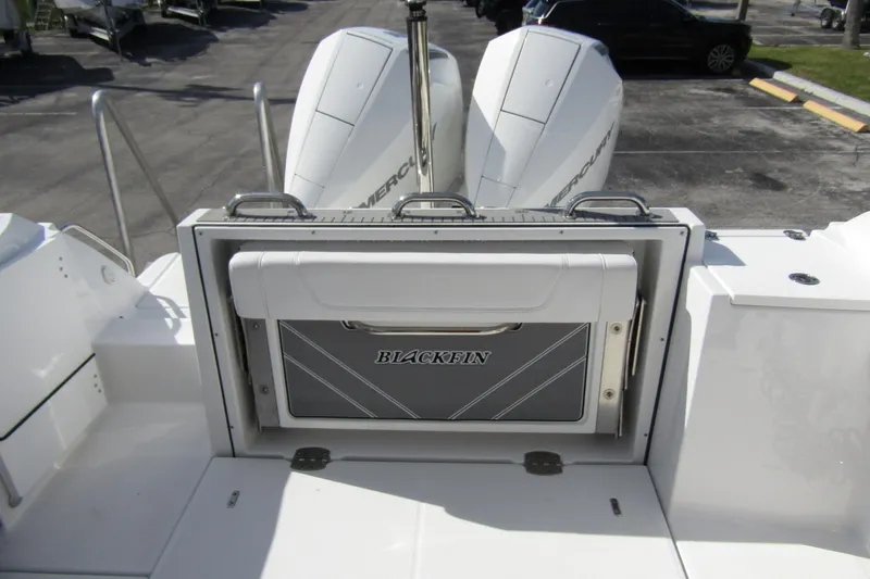  Yacht Photos Pics 2023 Blackfin 252 DC boat with dual Mercury engines, rear view.