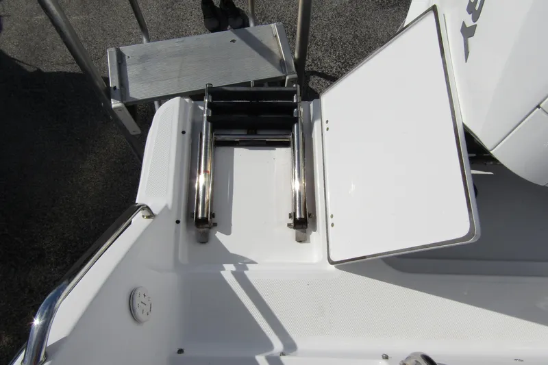  Yacht Photos Pics 2023 Blackfin 252 DC boat swim platform with foldable ladder and storage hatch.