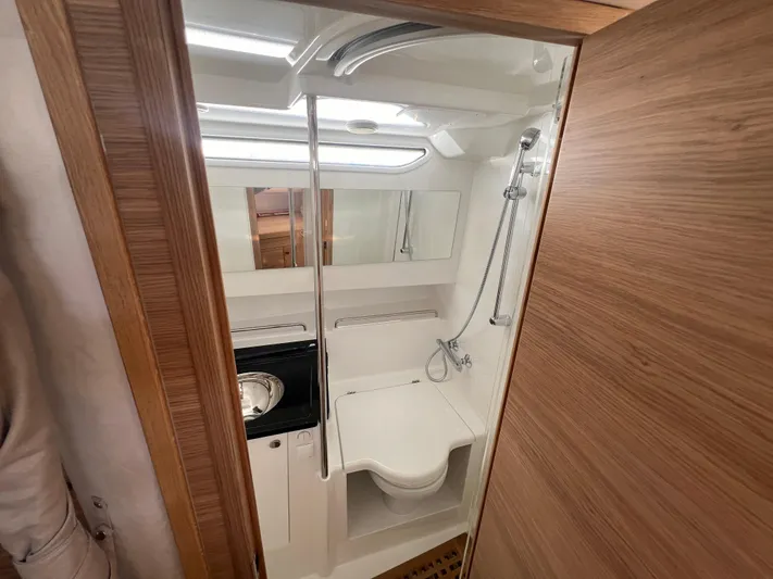 San #292 In Stock Yacht Photos Pics Modern bathroom in 2024 Nimbus T11 boat with shower and sink.