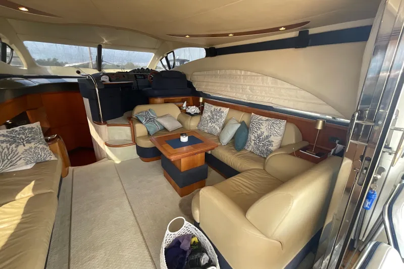  Yacht Photos Pics Luxurious interior of 2005 Azimut Fly 50 yacht with plush seating and elegant decor.