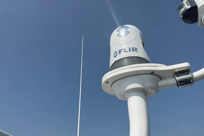  Yacht Photos Pics FLIR camera on 2005 Azimut Fly 50 yacht against clear blue sky.