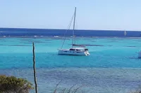 Nautitech 46 Open catamaran sailing in clear blue waters, 2018 model.