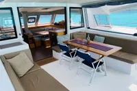 Luxurious interior of 2018 Nautitech 46 Open catamaran with spacious seating and dining area.