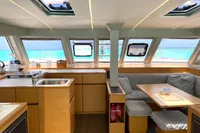 Interior of 2018 Nautitech 46 Open catamaran with modern kitchen and seating area.