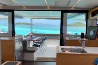 Interior view of 2018 Nautitech 46 Open catamaran with ocean backdrop.