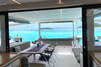 Interior view of 2018 Nautitech 46 Open catamaran with ocean backdrop.