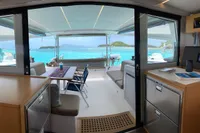 Interior view of 2018 Nautitech 46 Open catamaran with ocean backdrop.