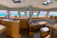 Interior of 2018 Nautitech 46 Open catamaran with panoramic windows and modern kitchen.