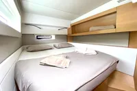 Cozy bedroom in 2018 Nautitech 46 Open catamaran with modern design and natural light.