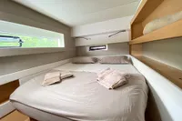 Cozy bedroom in 2018 Nautitech 46 Open catamaran with modern design and natural light.