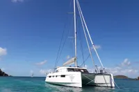 2018 Nautitech 46 Open catamaran sailing in clear blue waters.
