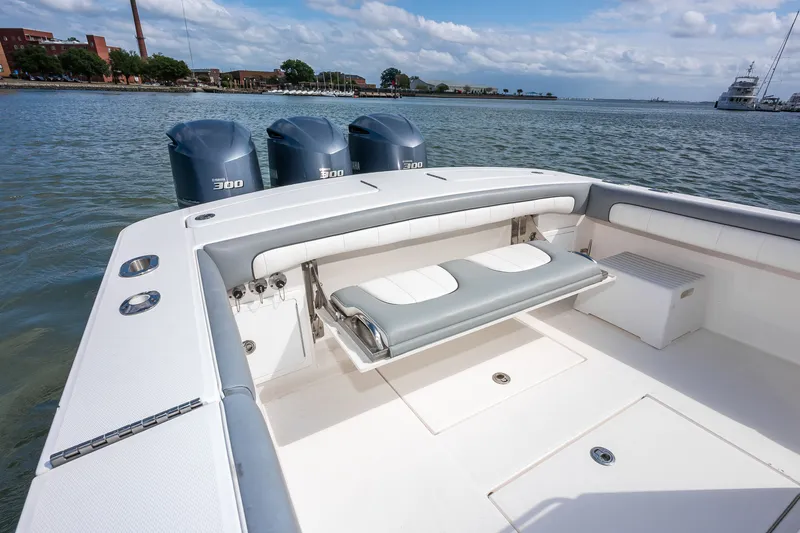 Dauntless Yacht Photos Pics 2018 Regulator 34 FS boat with triple 300 engines, spacious deck, and seating.