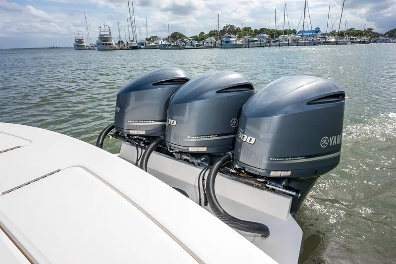 Dauntless Yacht Photos Pics 2018 Regulator 34 FS boat with triple Yamaha outboard engines on the water.