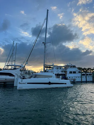 Encore Yacht Photos Pics Sailboat Bali 4.1, 2020 model, docked at marina during sunset with cloudy sky.