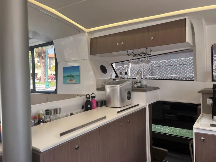 Encore Yacht Photos Pics Modern kitchen interior on a 2020 Bali 4.1 yacht, featuring sleek cabinetry and appliances.