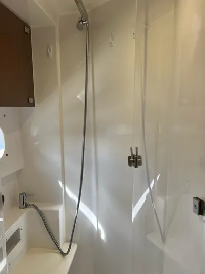 Encore Yacht Photos Pics Compact shower area in a 2020 Bali 4.1 model, featuring sleek fixtures and modern design.