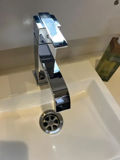 Encore Yacht Photos Pics Modern chrome faucet over white sink, Bali 4.1 model, 2020.