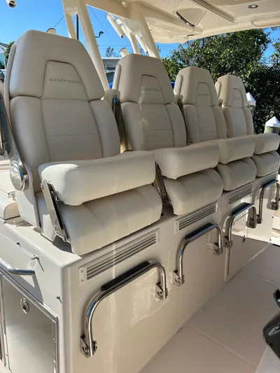  Yacht Photos Pics 2024 Grady-White Canyon 456 boat seats, luxurious white leather design.