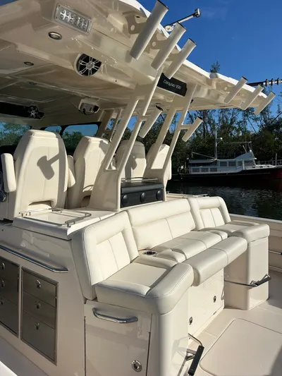  Yacht Photos Pics 2024 Grady-White Canyon 456 boat interior with luxurious seating and rod holders.