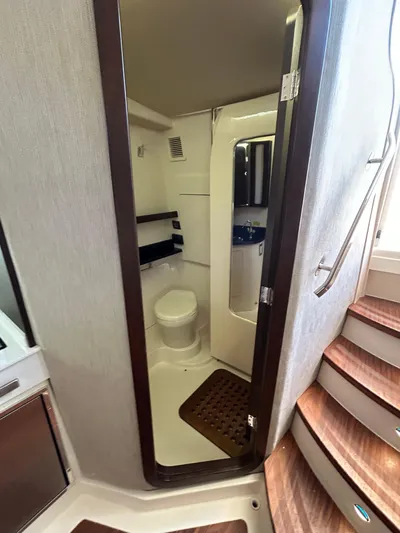  Yacht Photos Pics 2024 Grady-White Canyon 456 boat interior bathroom with modern amenities.